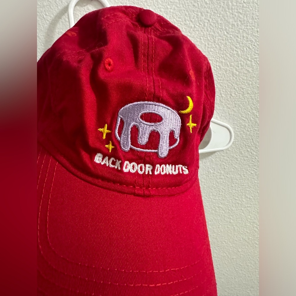 Red baseball cap - back door donuts